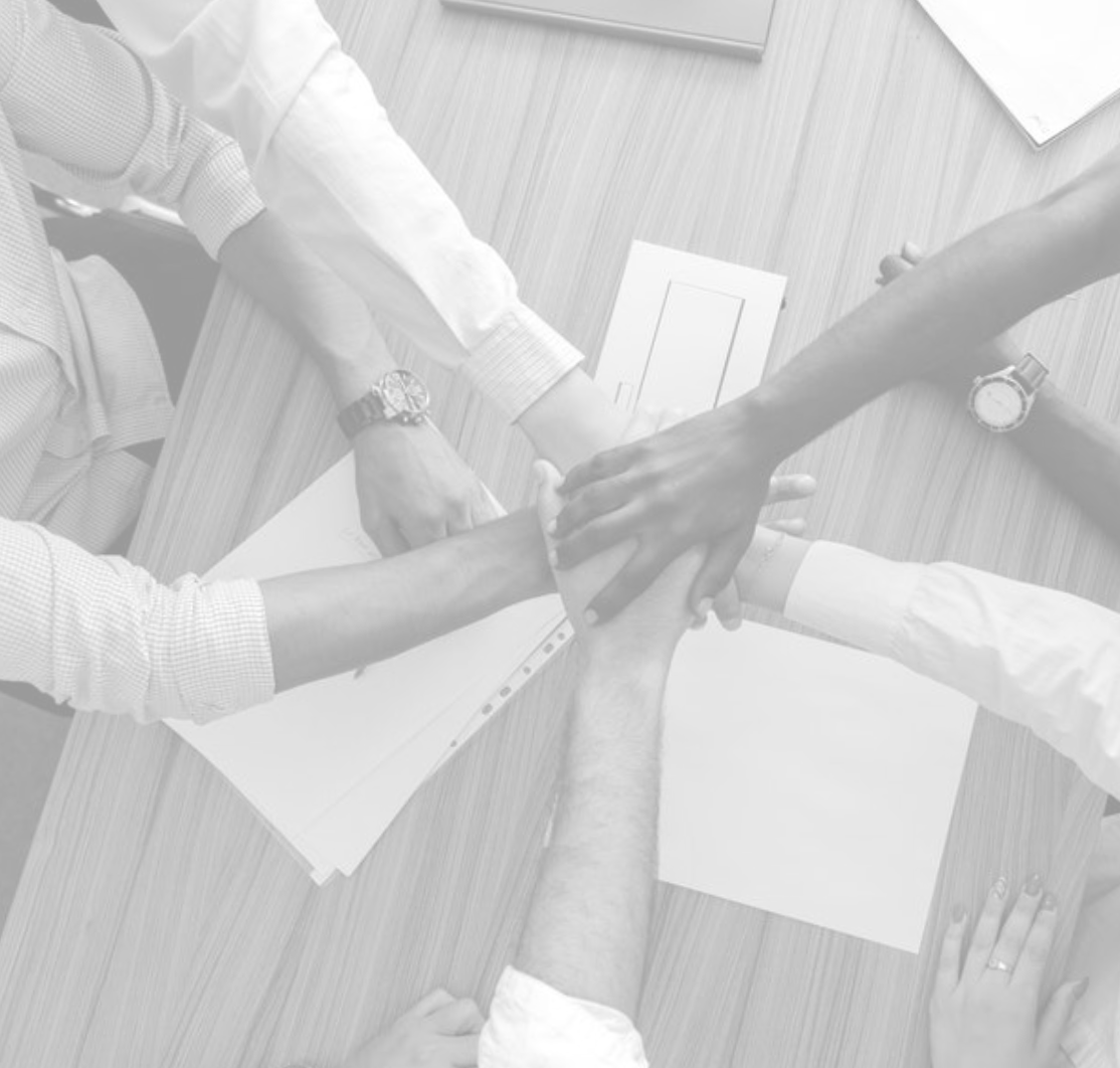 hands in a pile making a deal hands in a pile making a deal